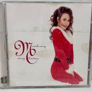 Merry Christmas by Mariah Carey. Pre-Owned. Tested & Played. Good.
